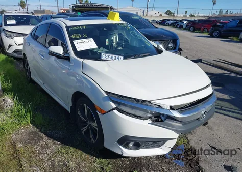 2017 Honda Civic Touring from USA, damaged, VIN 2HGFC1F97HH631639